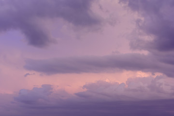 Abstract background of evening sky with rain clouds.