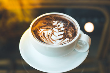 Hot chocolate art with coffee cup