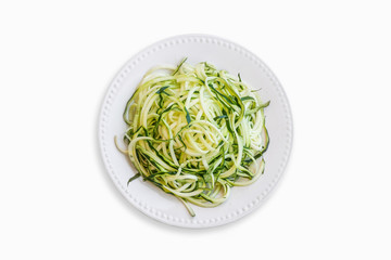 Zucchini Noodles over a wooden table