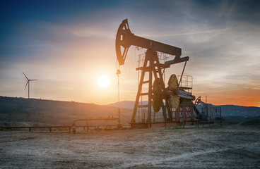 oil pump on sunset