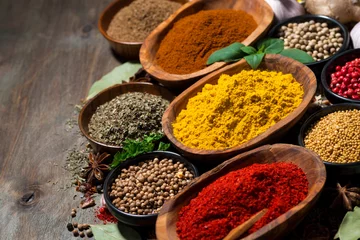 Keuken spatwand met foto assortment of oriental spices on a wooden background, top view © cook_inspire