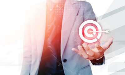 Businessman hand showing on target business concept with blank copyspace area for text or slogan,...