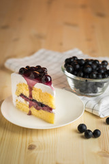delicious cool dessert background ,fresh sweet blueberry cake with white plate