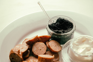 Caviare with Sausage and Cream