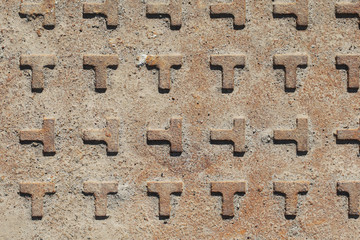 Rusty metal with large letters