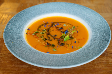 Vegan pumpkin soup with herbs