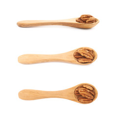 Spoon of pecan nuts isolated