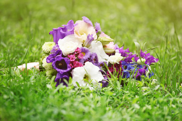 Beautiful bouquet of flowers on a green grass