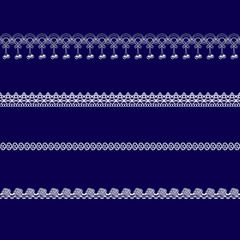 set of white lace ribbons