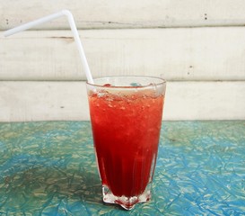 Ice tea in glass on retro table