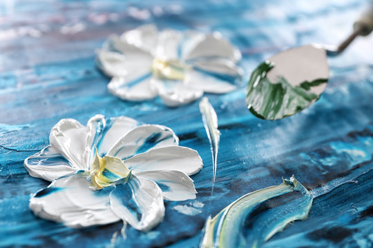 Oil painting of beautiful flowers and palette knife
