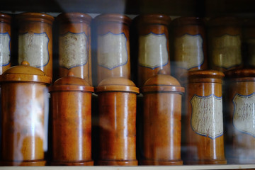Vintage bottles in old pharmacy, closeup