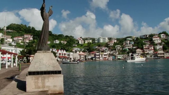 Statue of Christ of the Abyss near St George’s Inner Harbour in Grenada. Taken sunny day