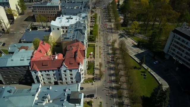 Top View of Lattelecom Marathon 2017, Riga City, Latvia, People running through the Streets of Old Riga Town along Park