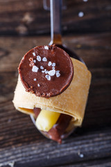 Chocolate dessert on spoon