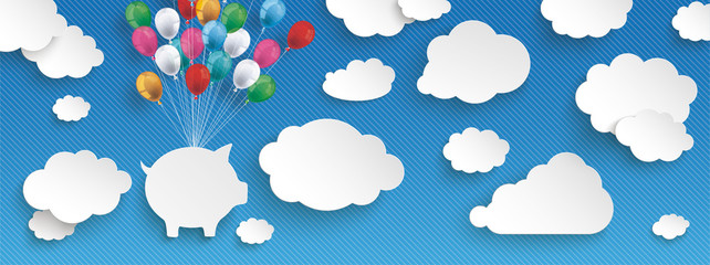 Sparschwein mit bunten Luftballons im Himmel zwischen den Wolken