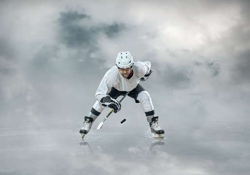 Ice hockey player on the ice, outdoors