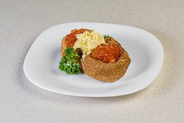 Pancakes with salmon caviar