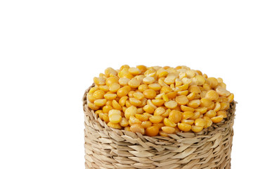 Dry yellow split peas isolated on white.