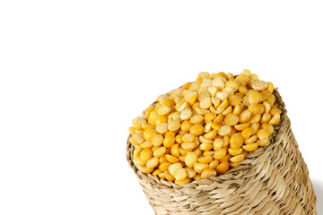 Dry yellow split peas isolated on white.