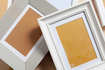 Fototapeta premium Blank photo frame on the table