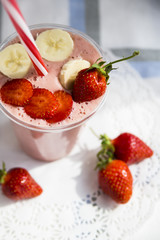 Strawberry-banana smoothie with milk or yoghurt