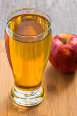 Fresh Apple juice with a red Apple