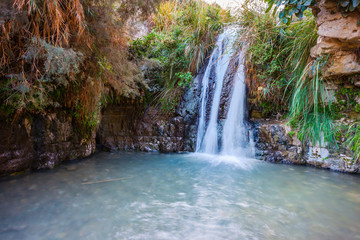 The waterfall and small deep lake © Kushnirov Avraham