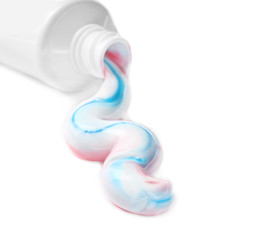 Tube with toothpaste on white background