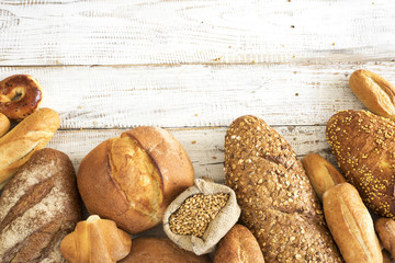 Freshly baked bread on wooden table