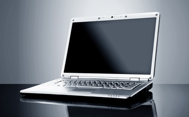 Modern laptop isolated on black background