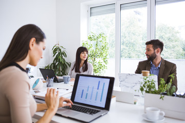 Businesspeople working in office