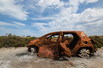 Abandoned car in desert