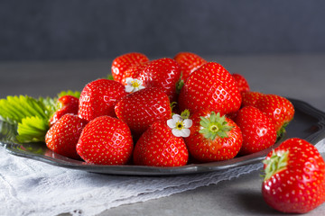 Organic fresh Strawberry. Red strawberry and blossom. Strawberry Juice. Loosely laid strawberries in different positions.