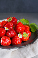 Organic fresh Strawberry. Red strawberry and blossom. Strawberry Juice. Loosely laid strawberries in different positions.