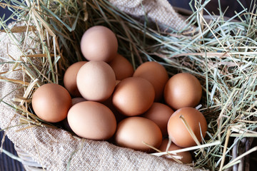 Chicken eggs on a wooden table