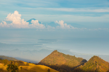 Fototapeta premium Panoramic view of the hills, clouds and Gili islands, Indonesia
