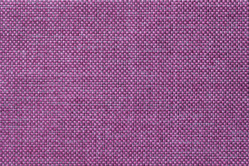 Dark violet background of dense woven bagging fabric, closeup. Structure of the textile macro.