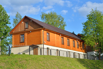 Wooden one-storeyed apartment house on the embankment of the river great