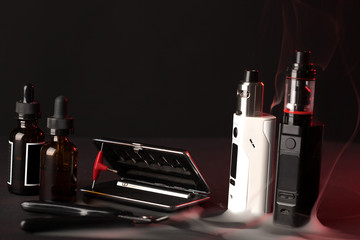 Vaping set on dark background