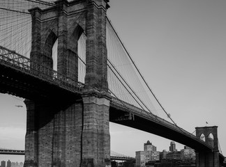 Fototapeta na wymiar Brooklyn Bridge low angle in black and white.