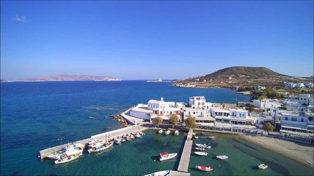 Drone flight over the port of the village Pollonia on the Island of Milos in Greece