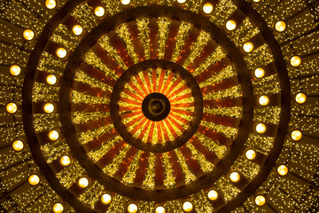 Large yellow-red chandelier bottom view closeup