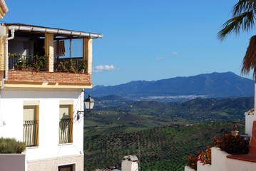 Fototapeta na wymiar Townhouse with a terrace overlooking the countryside, Alozaina, Spain.