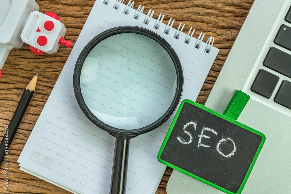 Poster seo search engine optimization website analysis concept with pencil, computer, robot and magnifying 