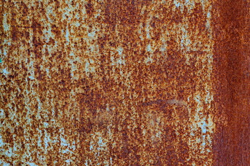 Background of a rusty old iron metal sheet, orange and brown colors