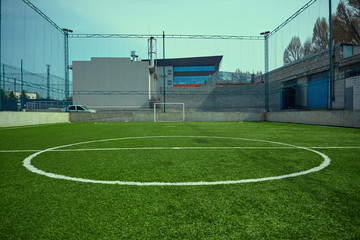 The empty football field and green grass