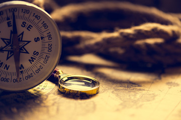 compass and magnifying glass
