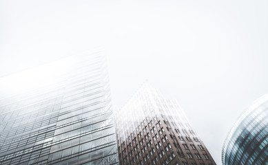 Skyscraper buildings in misty fog - modern architecture