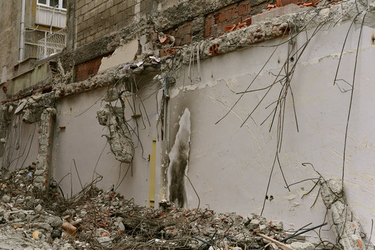 closeup of building demolition after earthquake